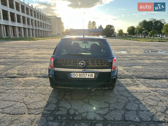 Черный Опель Астра, объемом двигателя 1.6 л и пробегом 261 тыс. км за 5600 $, фото 7 на Automoto.ua
