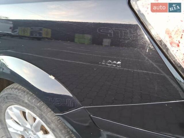 Черный Опель Астра, объемом двигателя 1.7 л и пробегом 276 тыс. км за 4300 $, фото 5 на Automoto.ua
