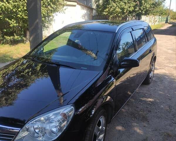 Черный Опель Астра, объемом двигателя 1.6 л и пробегом 205 тыс. км за 5700 $, фото 4 на Automoto.ua