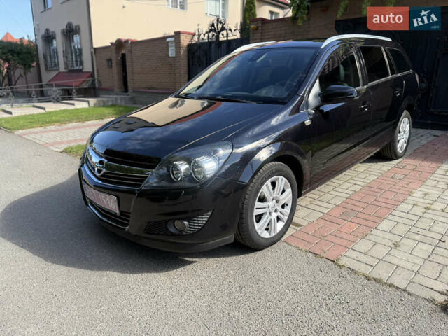 Черный Опель Астра, объемом двигателя 1.8 л и пробегом 241 тыс. км за 5500 $, фото 9 на Automoto.ua