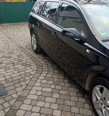 Черный Опель Астра, объемом двигателя 1.6 л и пробегом 249 тыс. км за 5650 $, фото 7 на Automoto.ua