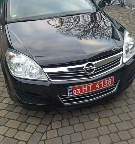 Черный Опель Астра, объемом двигателя 1.6 л и пробегом 249 тыс. км за 5650 $, фото 4 на Automoto.ua