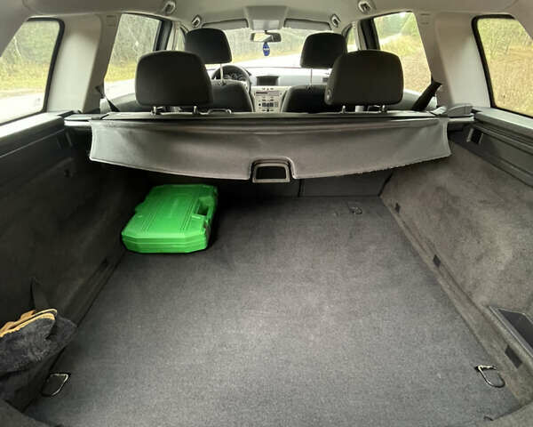 Черный Опель Астра, объемом двигателя 1.6 л и пробегом 191 тыс. км за 5999 $, фото 12 на Automoto.ua