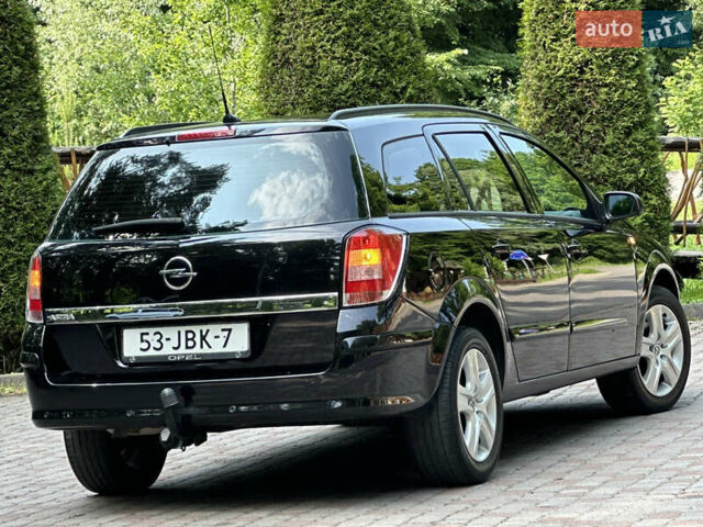 Черный Опель Астра, объемом двигателя 1.6 л и пробегом 157 тыс. км за 5499 $, фото 49 на Automoto.ua