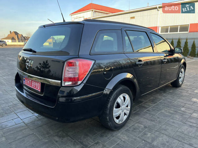 Черный Опель Астра, объемом двигателя 1.4 л и пробегом 242 тыс. км за 4450 $, фото 16 на Automoto.ua