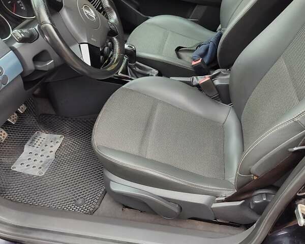 Черный Опель Астра, объемом двигателя 1.8 л и пробегом 225 тыс. км за 6800 $, фото 18 на Automoto.ua
