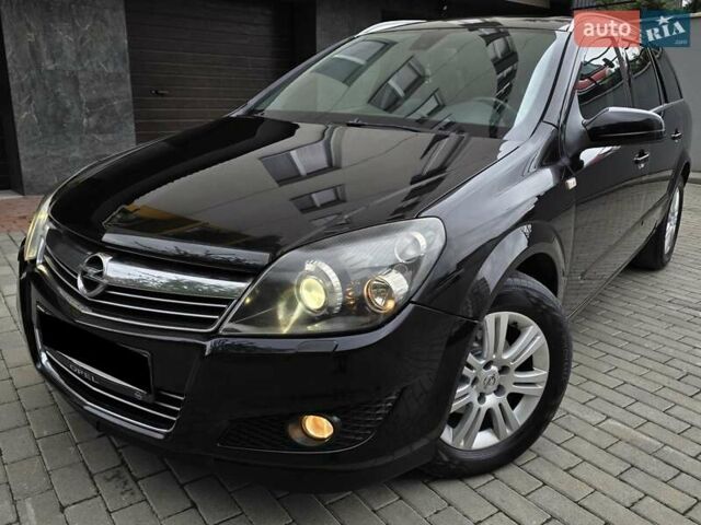 Черный Опель Астра, объемом двигателя 1.7 л и пробегом 224 тыс. км за 5650 $, фото 1 на Automoto.ua