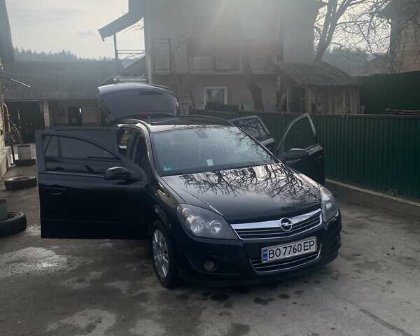 Черный Опель Астра, объемом двигателя 1.69 л и пробегом 250 тыс. км за 6500 $, фото 1 на Automoto.ua