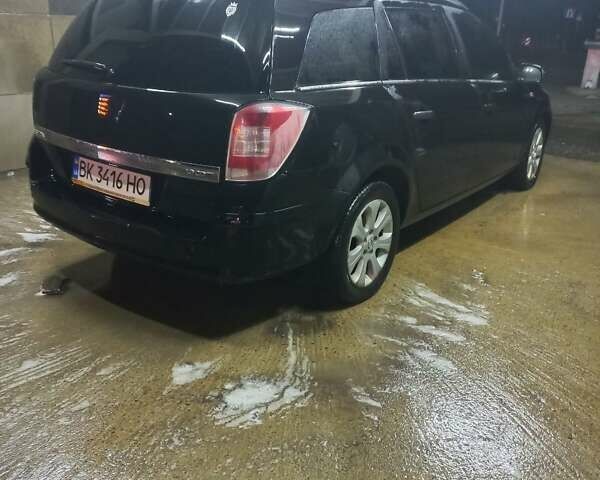 Черный Опель Астра, объемом двигателя 1.9 л и пробегом 266 тыс. км за 5550 $, фото 15 на Automoto.ua