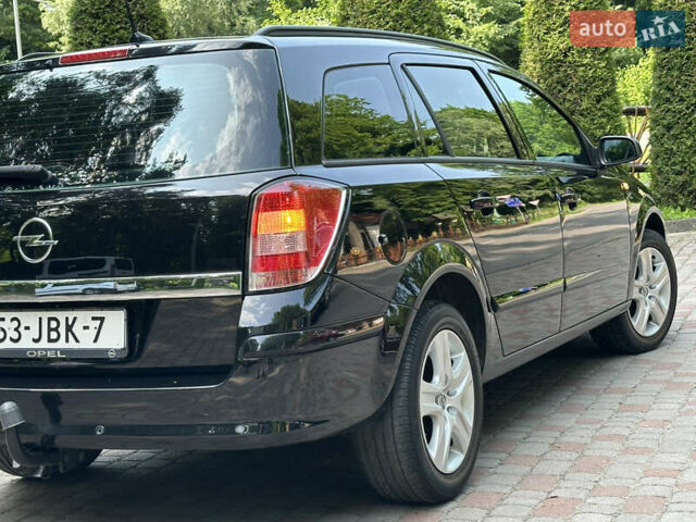 Черный Опель Астра, объемом двигателя 1.6 л и пробегом 157 тыс. км за 5499 $, фото 52 на Automoto.ua