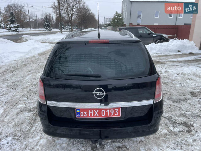 Черный Опель Астра, объемом двигателя 1.6 л и пробегом 240 тыс. км за 5600 $, фото 3 на Automoto.ua