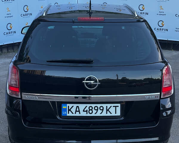 Черный Опель Астра, объемом двигателя 1.7 л и пробегом 251 тыс. км за 5499 $, фото 14 на Automoto.ua