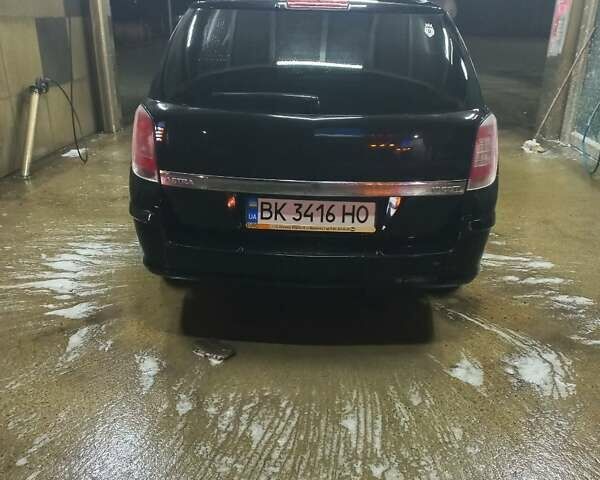 Черный Опель Астра, объемом двигателя 1.9 л и пробегом 266 тыс. км за 5550 $, фото 18 на Automoto.ua