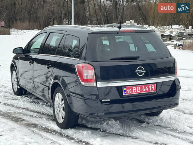 Черный Опель Астра, объемом двигателя 1.6 л и пробегом 148 тыс. км за 6300 $, фото 6 на Automoto.ua