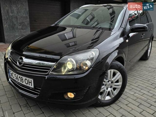 Черный Опель Астра, объемом двигателя 1.7 л и пробегом 224 тыс. км за 5599 $, фото 1 на Automoto.ua