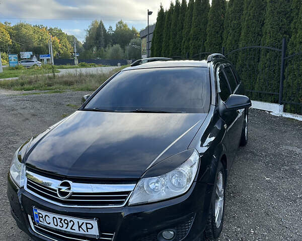 Чорний Опель Астра, об'ємом двигуна 1.69 л та пробігом 240 тис. км за 5300 $, фото 2 на Automoto.ua