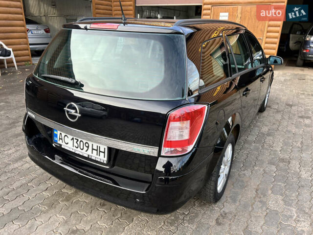 Черный Опель Астра, объемом двигателя 1.69 л и пробегом 192 тыс. км за 5900 $, фото 7 на Automoto.ua