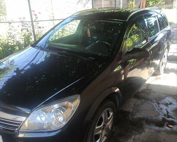 Черный Опель Астра, объемом двигателя 1.6 л и пробегом 205 тыс. км за 5700 $, фото 21 на Automoto.ua
