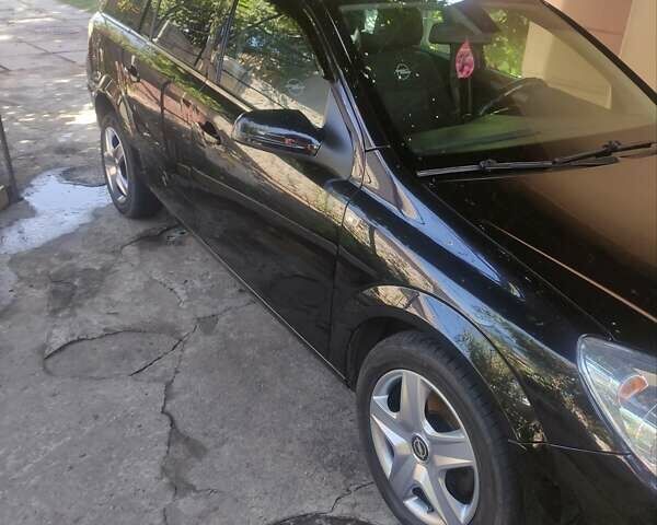 Черный Опель Астра, объемом двигателя 1.6 л и пробегом 205 тыс. км за 5700 $, фото 6 на Automoto.ua