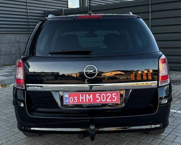 Черный Опель Астра, объемом двигателя 1.6 л и пробегом 160 тыс. км за 6200 $, фото 25 на Automoto.ua