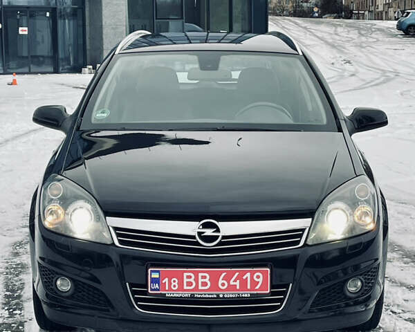 Черный Опель Астра, объемом двигателя 1.6 л и пробегом 148 тыс. км за 6300 $, фото 1 на Automoto.ua