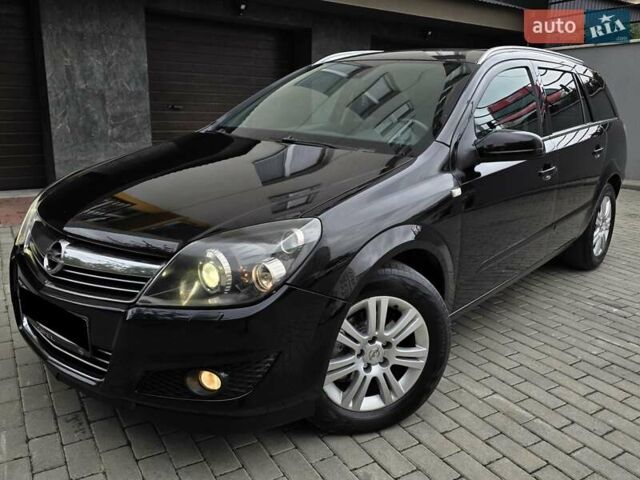 Черный Опель Астра, объемом двигателя 1.7 л и пробегом 224 тыс. км за 5650 $, фото 2 на Automoto.ua