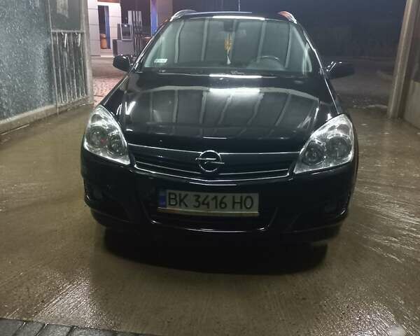 Черный Опель Астра, объемом двигателя 1.9 л и пробегом 266 тыс. км за 5550 $, фото 14 на Automoto.ua