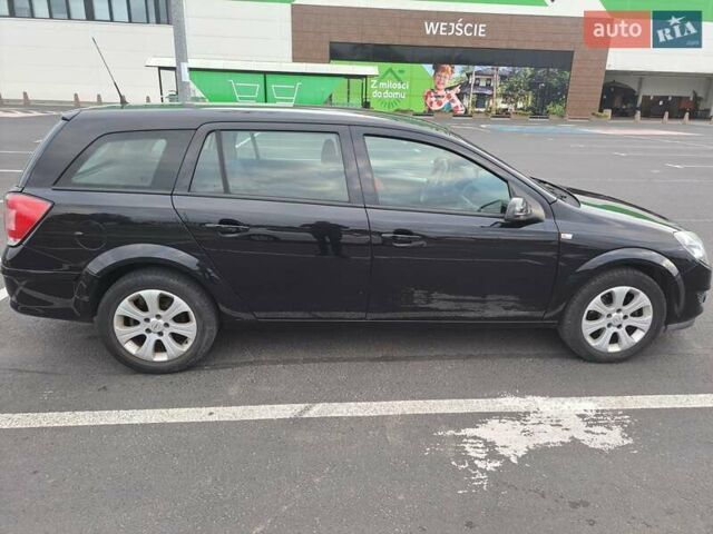 Черный Опель Астра, объемом двигателя 1.6 л и пробегом 212 тыс. км за 5200 $, фото 13 на Automoto.ua