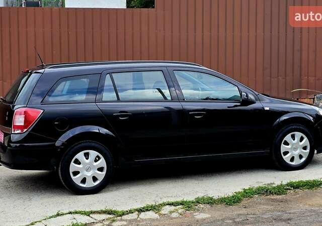 Черный Опель Астра, объемом двигателя 1.6 л и пробегом 238 тыс. км за 6299 $, фото 17 на Automoto.ua