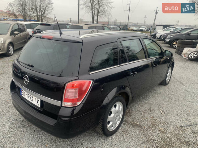 Черный Опель Астра, объемом двигателя 1.6 л и пробегом 232 тыс. км за 5500 $, фото 7 на Automoto.ua