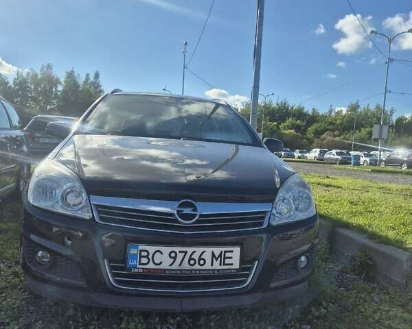 Черный Опель Астра, объемом двигателя 1.6 л и пробегом 200 тыс. км за 4900 $, фото 10 на Automoto.ua