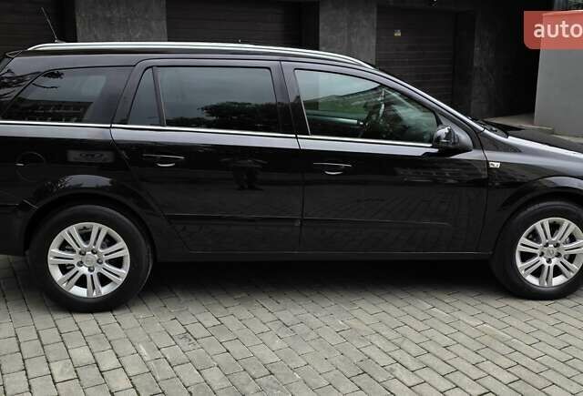 Черный Опель Астра, объемом двигателя 1.7 л и пробегом 224 тыс. км за 5650 $, фото 11 на Automoto.ua