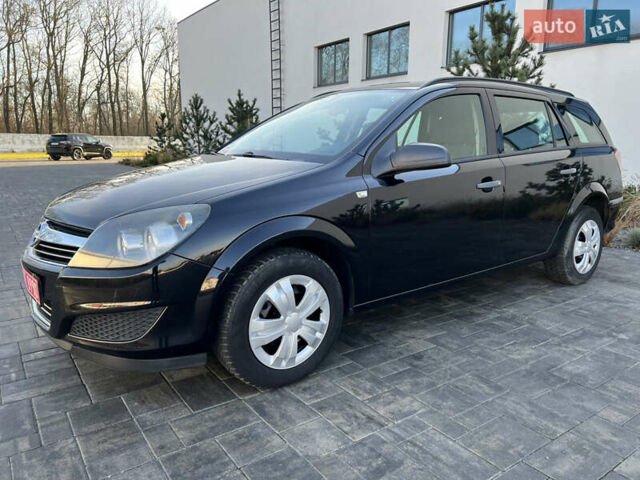 Черный Опель Астра, объемом двигателя 1.4 л и пробегом 242 тыс. км за 4450 $, фото 5 на Automoto.ua