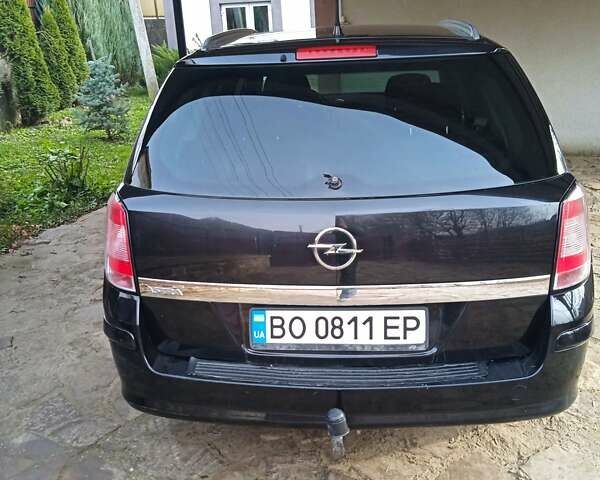 Черный Опель Астра, объемом двигателя 1.6 л и пробегом 168 тыс. км за 5400 $, фото 7 на Automoto.ua