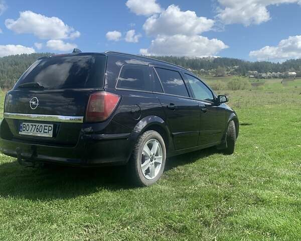 Черный Опель Астра, объемом двигателя 1.69 л и пробегом 250 тыс. км за 6500 $, фото 11 на Automoto.ua