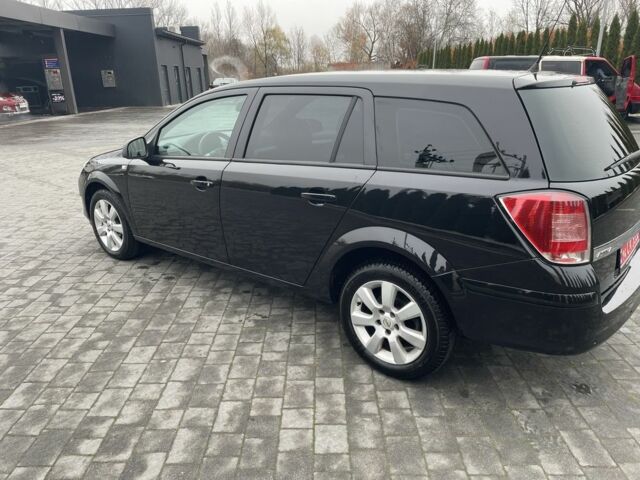 Черный Опель Астра, объемом двигателя 1.6 л и пробегом 260 тыс. км за 5550 $, фото 10 на Automoto.ua