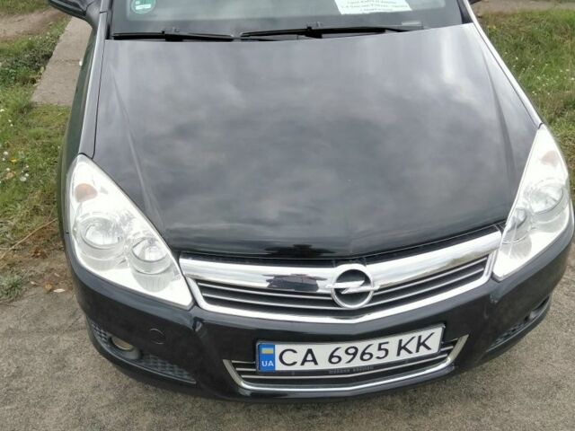 Черный Опель Астра, объемом двигателя 1.4 л и пробегом 218 тыс. км за 4550 $, фото 12 на Automoto.ua