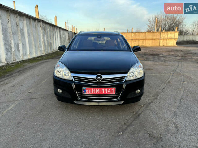 Черный Опель Астра, объемом двигателя 1.6 л и пробегом 217 тыс. км за 6200 $, фото 1 на Automoto.ua