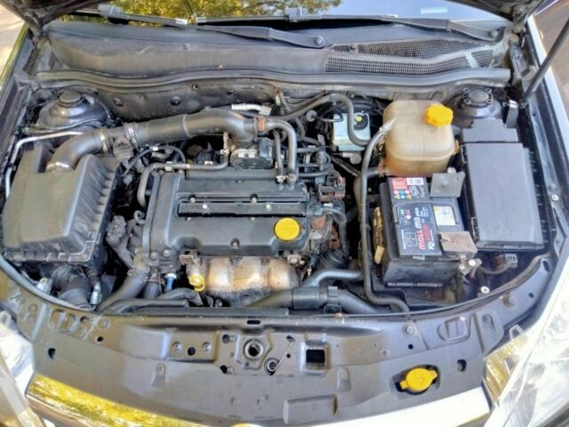 Черный Опель Астра, объемом двигателя 1.4 л и пробегом 218 тыс. км за 4550 $, фото 2 на Automoto.ua