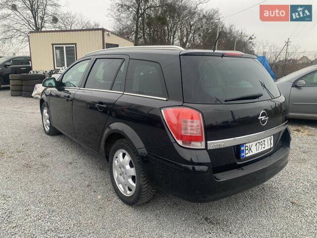 Черный Опель Астра, объемом двигателя 1.6 л и пробегом 232 тыс. км за 5500 $, фото 9 на Automoto.ua