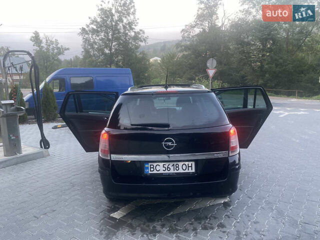 Черный Опель Астра, объемом двигателя 1.7 л и пробегом 224 тыс. км за 4700 $, фото 10 на Automoto.ua