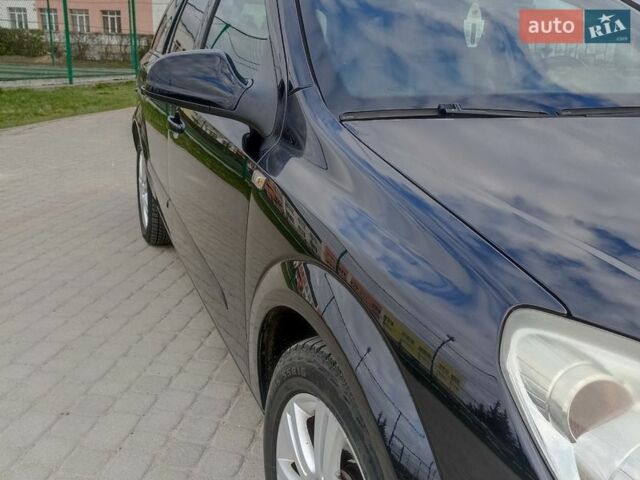Черный Опель Астра, объемом двигателя 1.6 л и пробегом 257 тыс. км за 5650 $, фото 2 на Automoto.ua