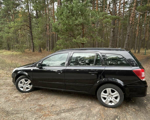 Черный Опель Астра, объемом двигателя 1.6 л и пробегом 191 тыс. км за 5999 $, фото 4 на Automoto.ua