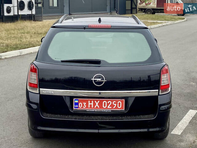 Черный Опель Астра, объемом двигателя 1.8 л и пробегом 200 тыс. км за 6999 $, фото 6 на Automoto.ua