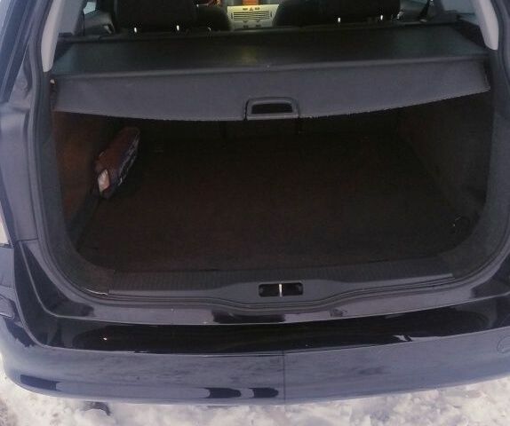 Черный Опель Астра, объемом двигателя 1.6 л и пробегом 260 тыс. км за 5999 $, фото 4 на Automoto.ua