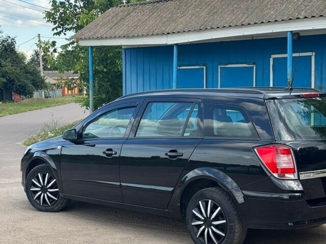 Чорний Опель Астра, об'ємом двигуна 1.6 л та пробігом 165 тис. км за 5099 $, фото 5 на Automoto.ua