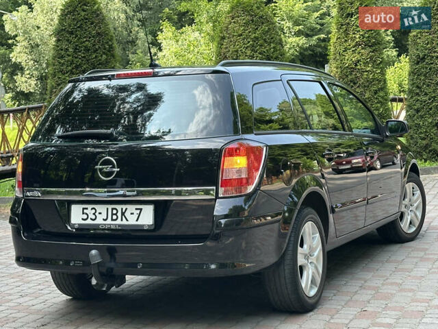 Черный Опель Астра, объемом двигателя 1.6 л и пробегом 157 тыс. км за 5499 $, фото 51 на Automoto.ua
