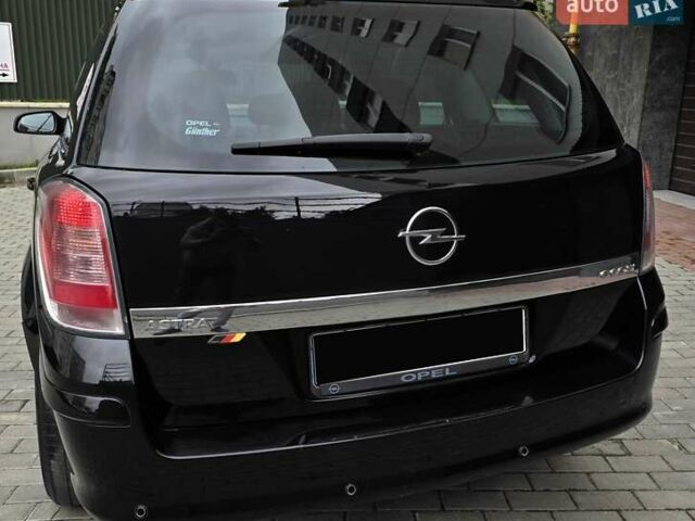 Черный Опель Астра, объемом двигателя 1.7 л и пробегом 224 тыс. км за 5650 $, фото 7 на Automoto.ua