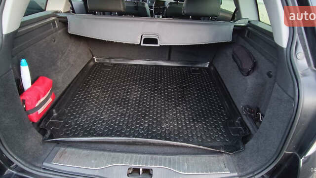 Черный Опель Астра, объемом двигателя 1.69 л и пробегом 268 тыс. км за 8000 $, фото 13 на Automoto.ua