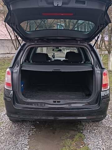 Черный Опель Астра, объемом двигателя 1.6 л и пробегом 216 тыс. км за 5500 $, фото 9 на Automoto.ua